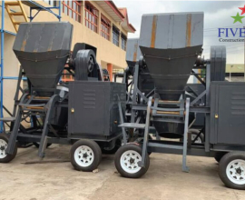 Concrete mixer with hoist